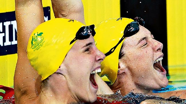 Triumph: Bronte (left) and Cate Campbell win gold and silver in the 100m freestyle final 
